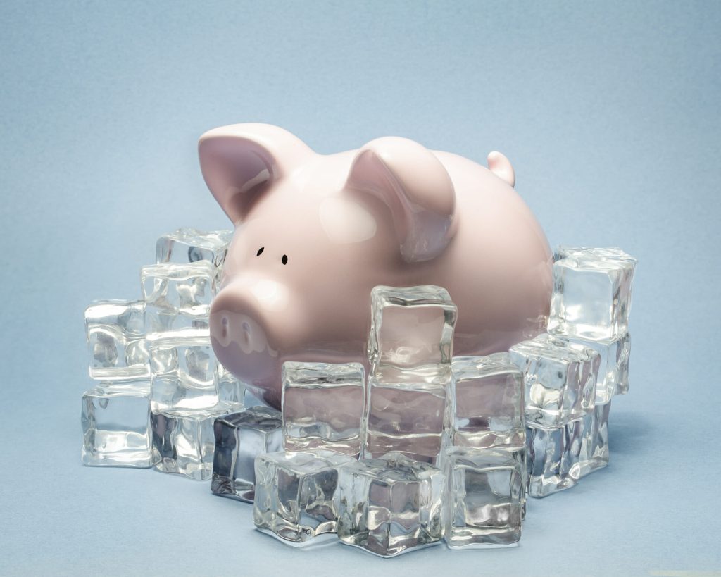 effect of money laundering investigation on a piggy bank